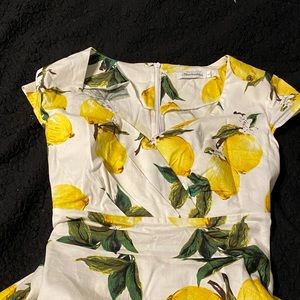 Lemon sweetheart neckline tea length dress.